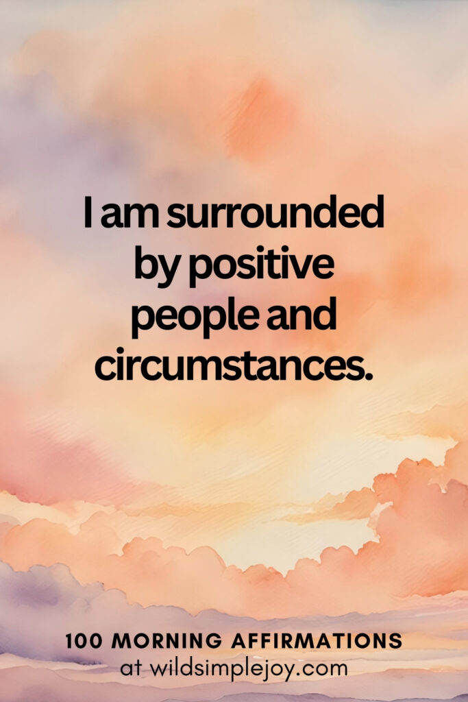 Vertical pin image with watercolor background and text overlay, I am surrounded by positive people and circumstances. Morning Affirmations at wildsimplejoy.com