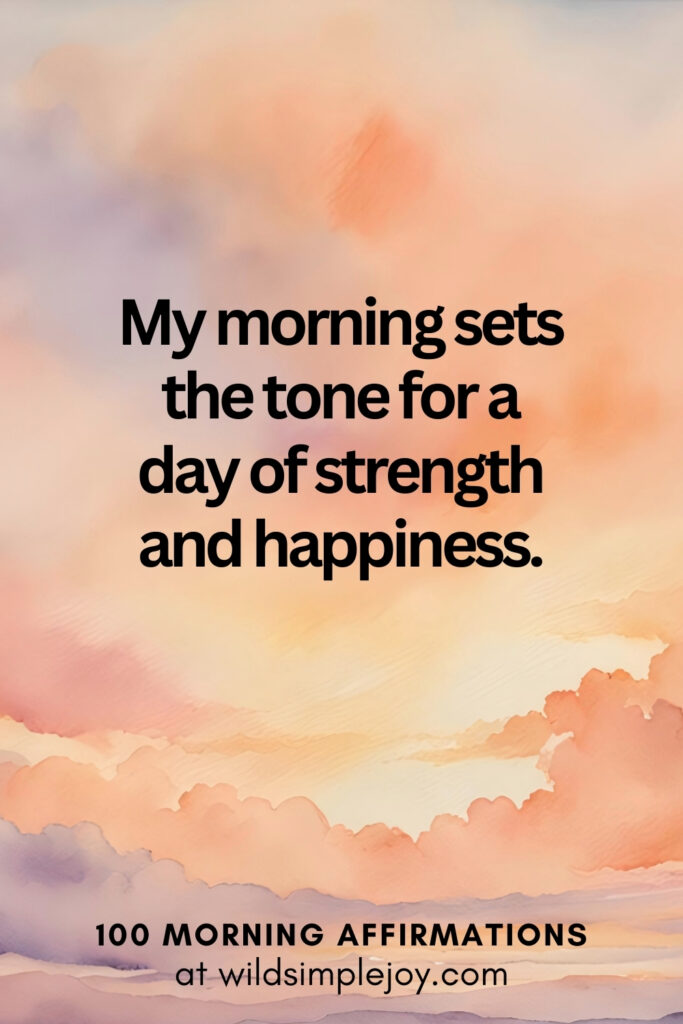 Vertical pin image with watercolor background and text overlay, My morning sets the tone for a day of strength. Morning Affirmations at wildsimplejoy.com