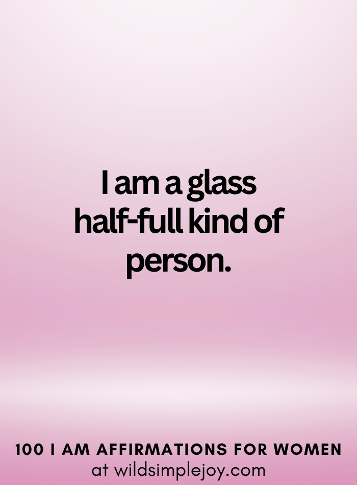 Vertical social media image with pink ombre background and text overlay that reads I am a glass half full kind of person 100 I Am Affirmations for Women at wildsimplejoy.com