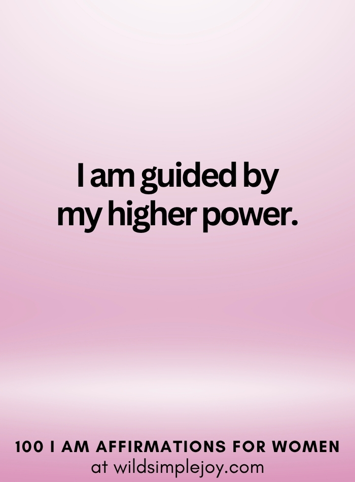 Vertical social media image with pink ombre background and text overlay that reads I am guided by a higher power 100 I Am Affirmations for Women at wildsimplejoy.com