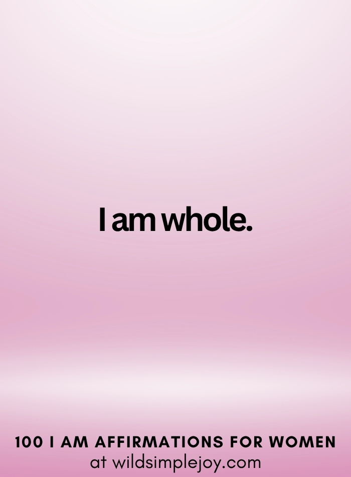 Vertical social media image with pink ombre background and text overlay that reads I am whole 100 I Am Affirmations for Women at wildsimplejoy.com
