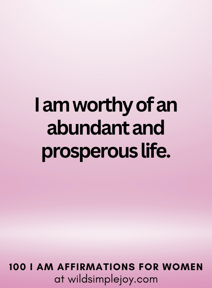 Vertical social media image with pink ombre background and text overlay that reads I am worthy of an abundant life100 I Am Affirmations for Women at wildsimplejoy.com