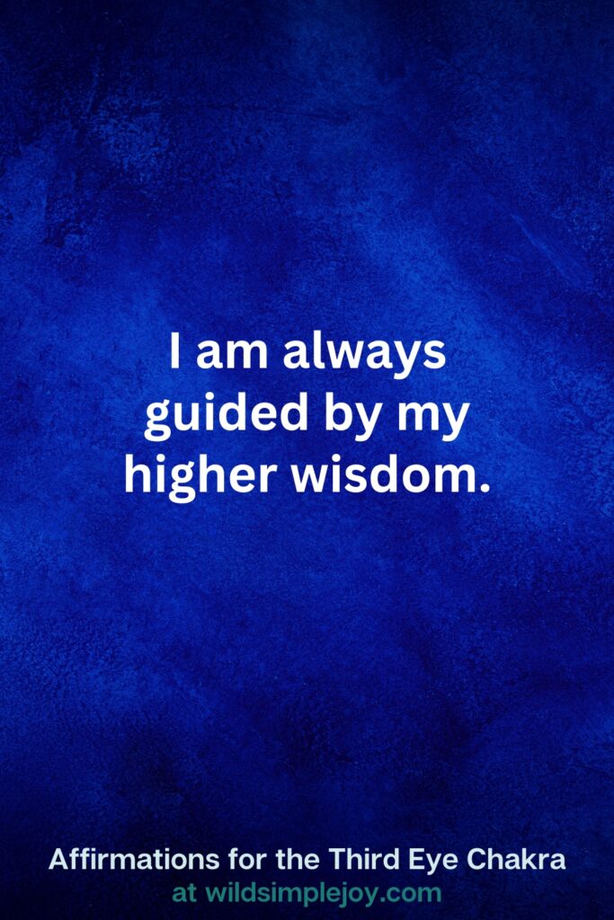 Vertical pin image on dark blue background with text overlay, I am always guided by my higher wisdom. Third Eye Chakra Affirmations at wildsimplejoy.com