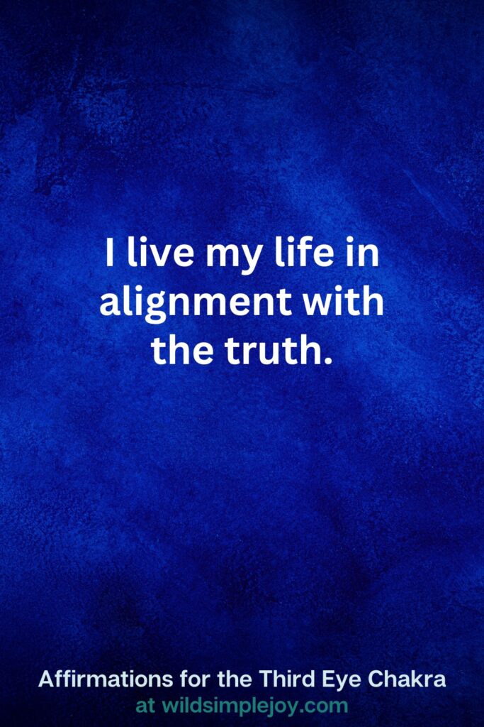 Vertical pin image on dark blue background with text overlay, I live my life in alignment with the truth. Third Eye Chakra Affirmations at wildsimplejoy.com