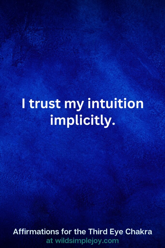 Vertical pin image on dark blue background with text overlay, I trust my intuition implicitly. Third Eye Chakra Affirmations at wildsimplejoy.com