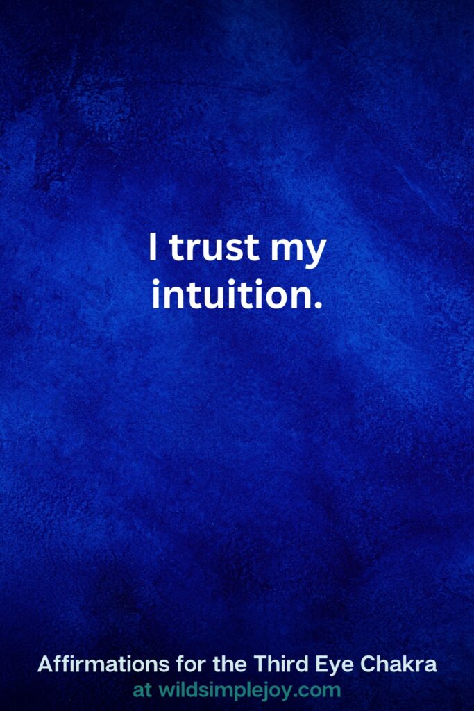 Vertical pin image on dark blue background with text overlay, I trust my intuition. Third Eye Chakra Affirmations at wildsimplejoy.com