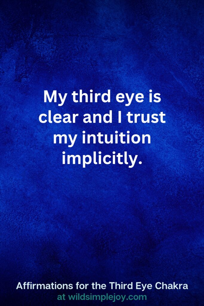 Vertical pin image on dark blue background with text overlay, My third eye is clear and I trust my intuition. Third Eye Chakra Affirmations at wildsimplejoy.com