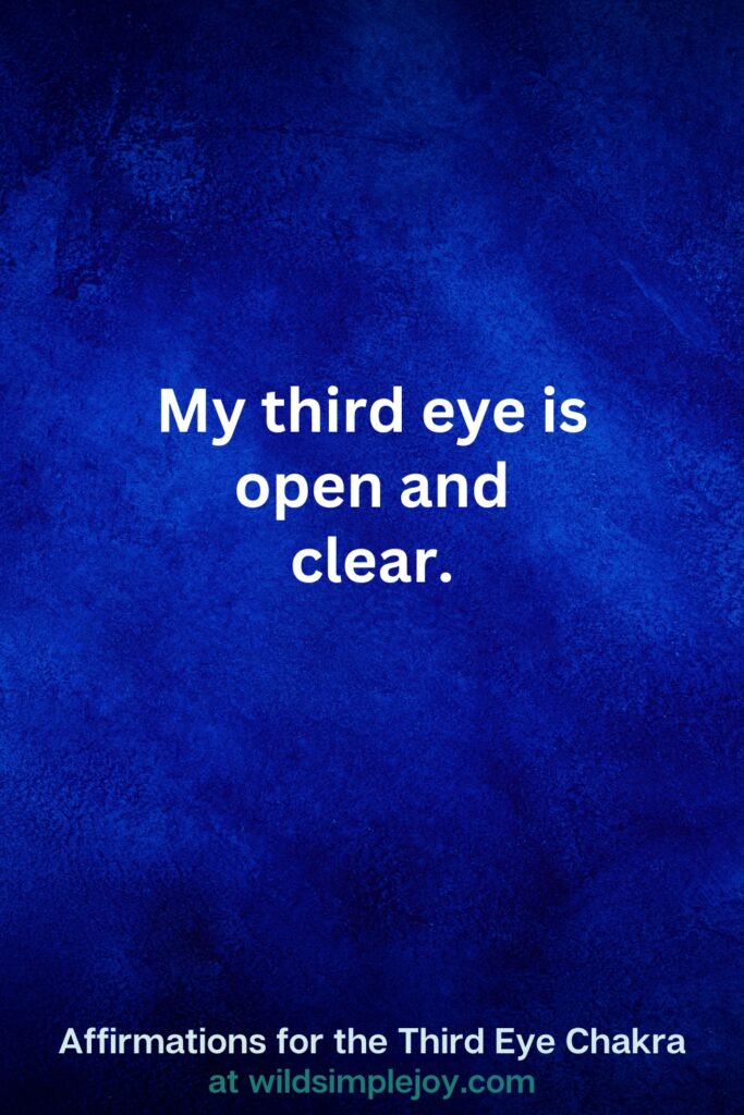 Vertical pin image on dark blue background with text overlay, My third eye is open and clear. Third Eye Chakra Affirmations at wildsimplejoy.com