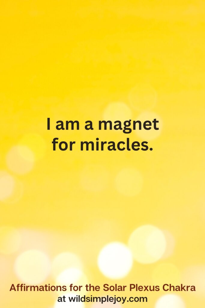 Vertical pin image with yellow background and text overlay that reads I am a magnet for miracles. Affirmations for the Solar Plexus Chakra at wildsimplejoy.com
