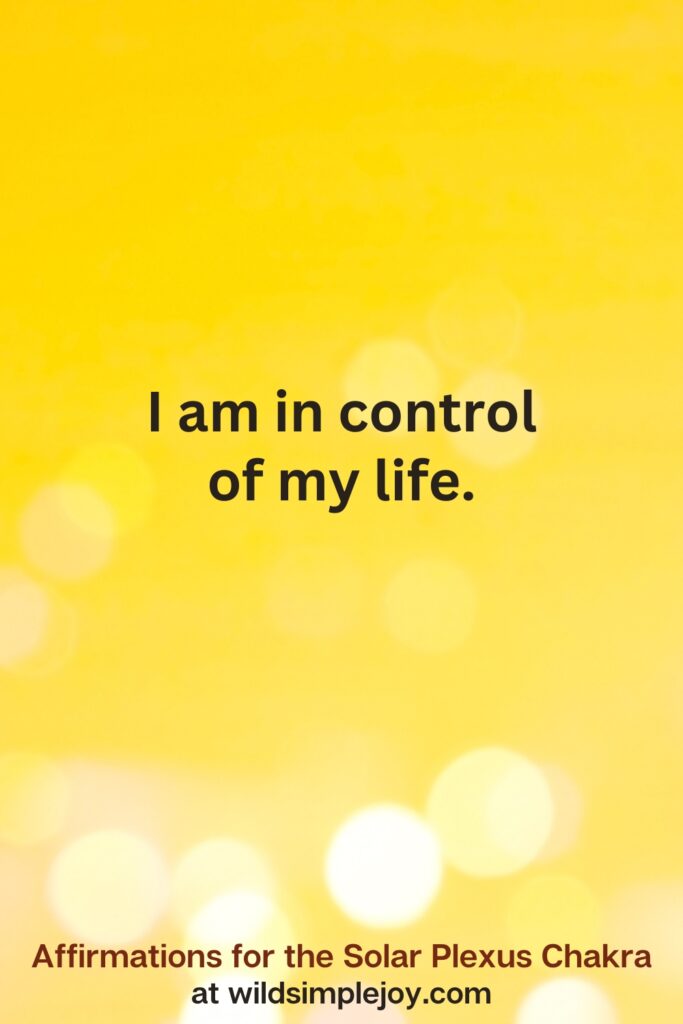 Vertical pin image with yellow background and text overlay that reads I am in control of my life. Affirmations for the Solar Plexus Chakra at wildsimplejoy.com