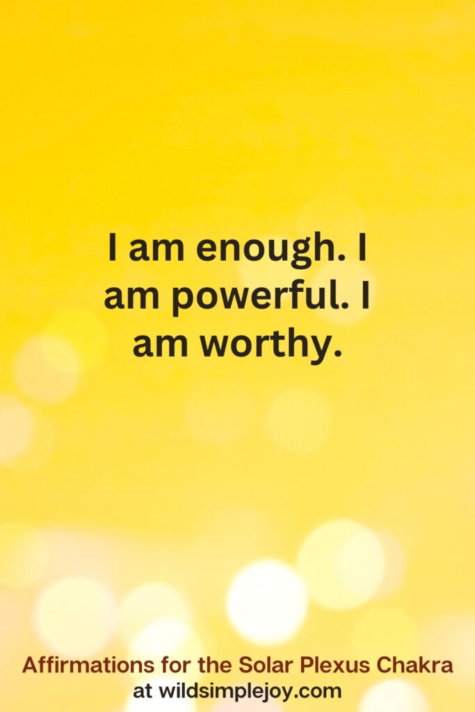 Vertical pin image with yellow background and text overlay that reads I am powerful. I am worthy. Affirmations for the Solar Plexus Chakra at wildsimplejoy.com