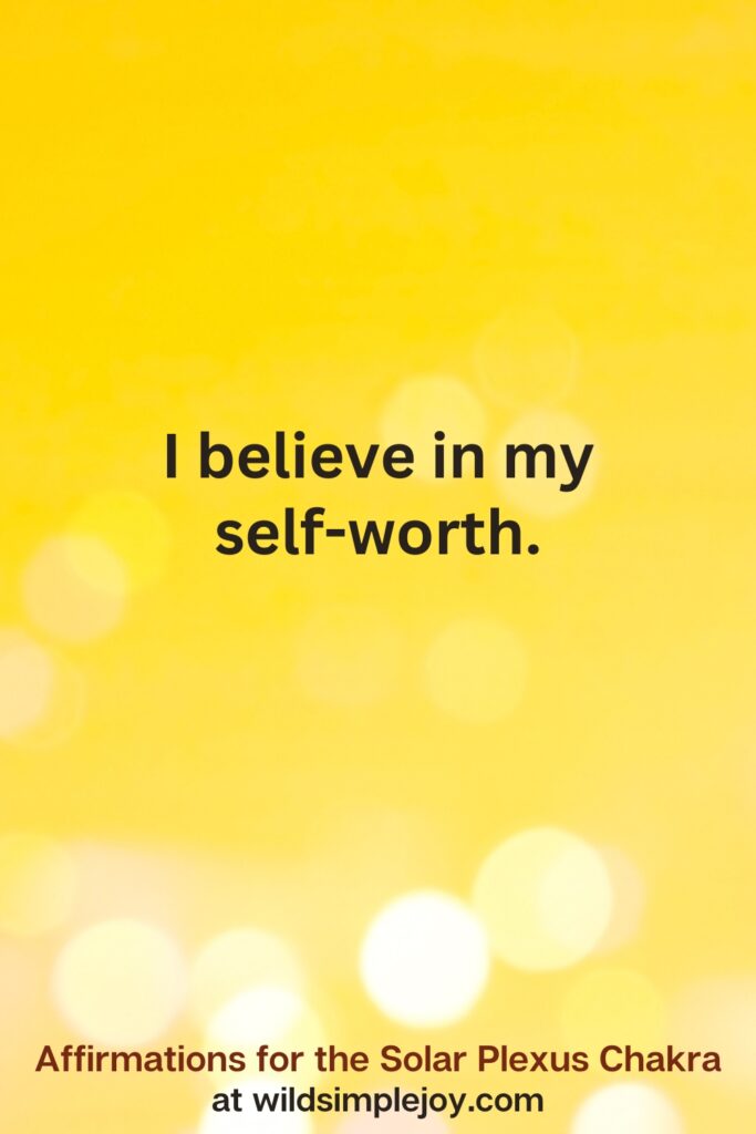 Vertical pin image with yellow background and text overlay that reads I believe in my self-worth. Affirmations for the Solar Plexus Chakra at wildsimplejoy.com