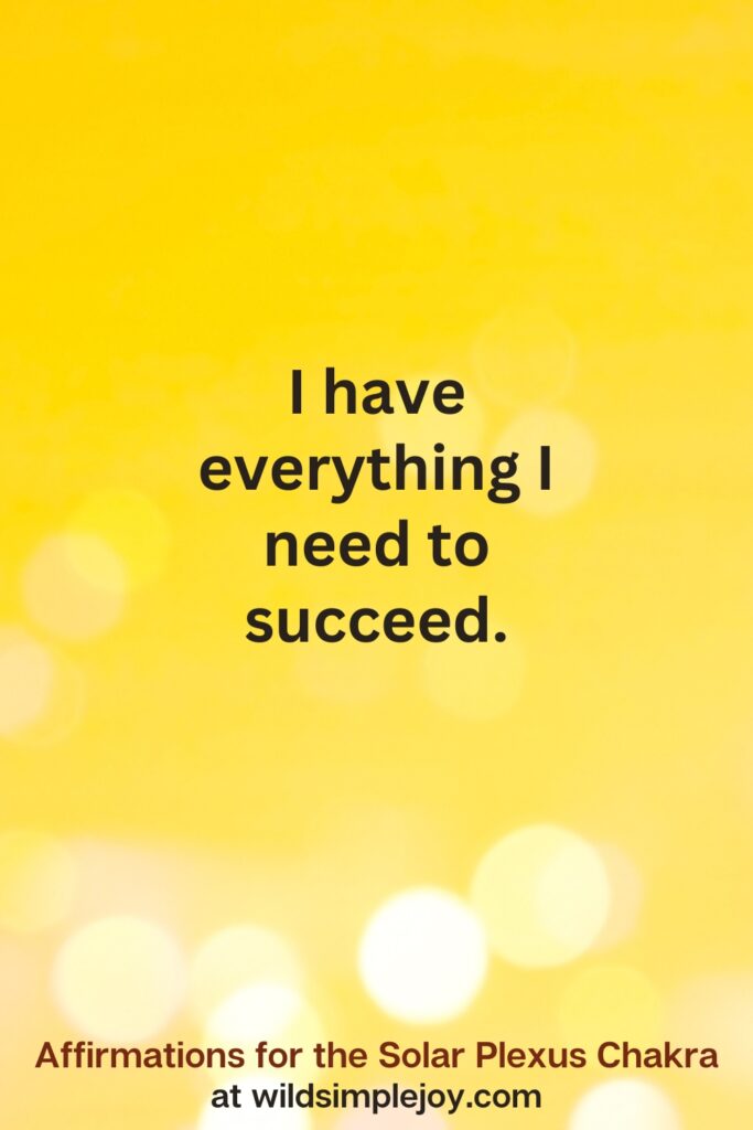 Vertical pin image with yellow background and text overlay that reads I have everything I need to succeed. Affirmations for the Solar Plexus Chakra at wildsimplejoy.com