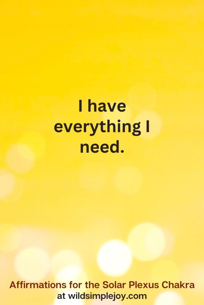 Vertical pin image with yellow background and text overlay that reads I have everything I need. Affirmations for the Solar Plexus Chakra at wildsimplejoy.com