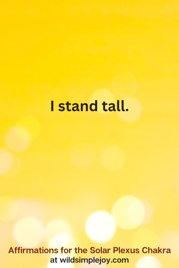 Vertical pin image with yellow background and text overlay that reads I stand tall. Affirmations for the Solar Plexus Chakra at wildsimplejoy.com
