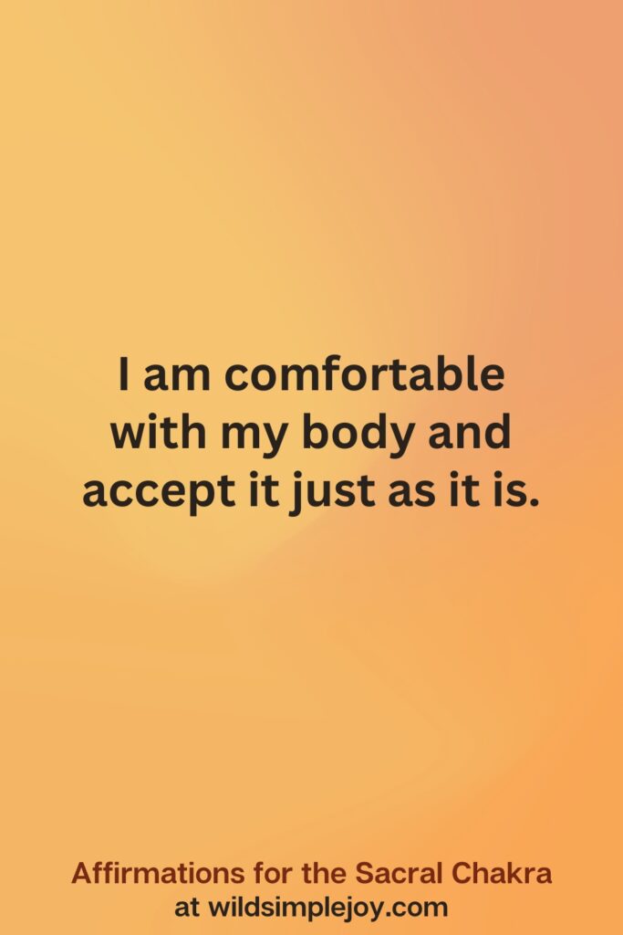 Vertical social media image on orange background with text overlay that reads I am comfortable with my body and accept it. Affirmations for the Sacral Chakra at wildsimplejoy.com