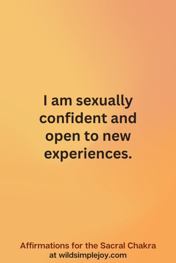 Vertical social media image on orange background with text overlay that reads I am sexually confident. Affirmations for the Sacral Chakra at wildsimplejoy.com
