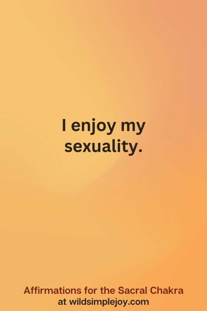 Vertical social media image on orange background with text overlay that reads I enjoy my sexuality. Affirmations for the Sacral Chakra at wildsimplejoy.com