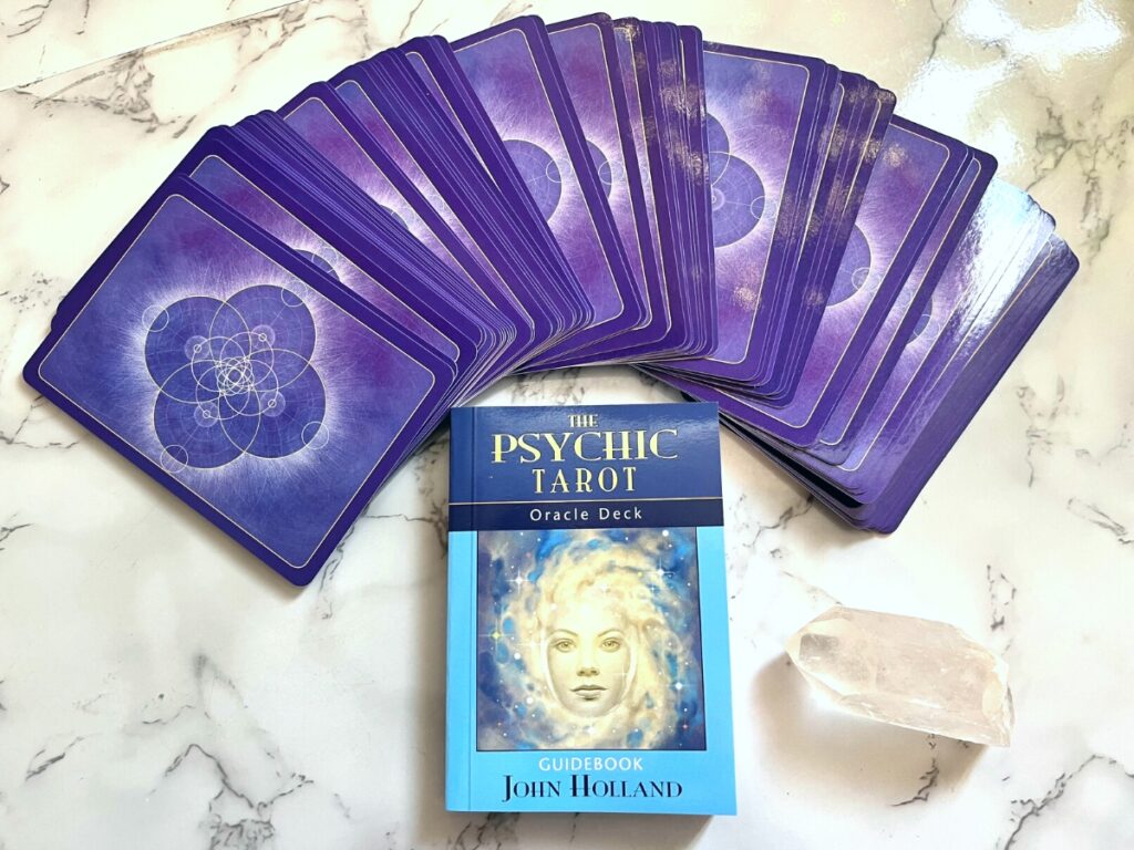 Psychic Tarot Oracle Deck spread out with booklet