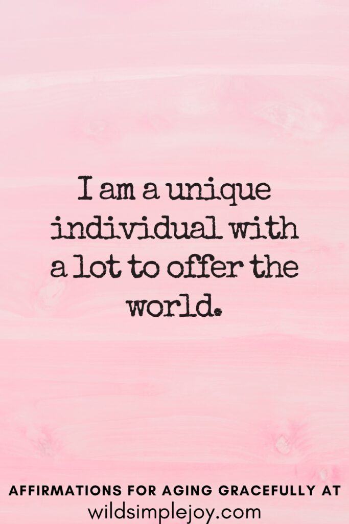 Vertical Pinterest Image on a pink background with text overlay I am a unique individual with a lot to offer the world Affirmations for Aging Gracefully at wildsimplejoy.com