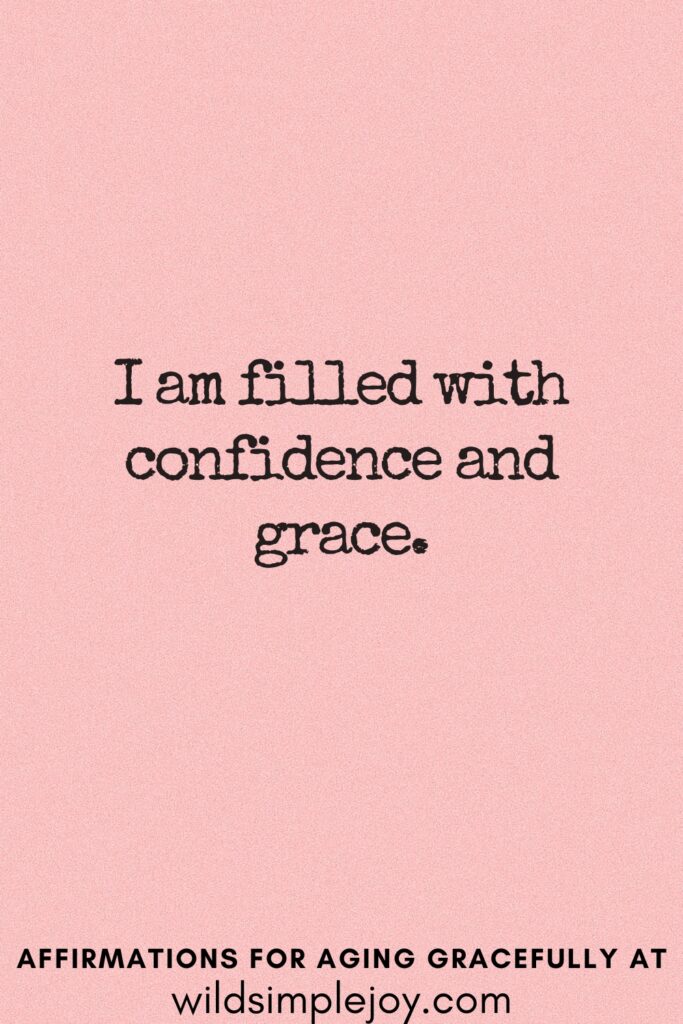 Vertical Pinterest Image on a pink background with text overlay I am filled with confidence and grace Affirmations for Aging Gracefully at wildsimplejoy.com