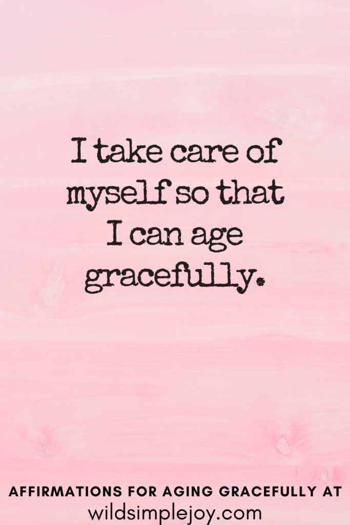 Vertical Pinterest Image on a pink background with text overlay I take care of myself so that I can age gracefully Affirmations for Aging Gracefully at wildsimplejoy.com