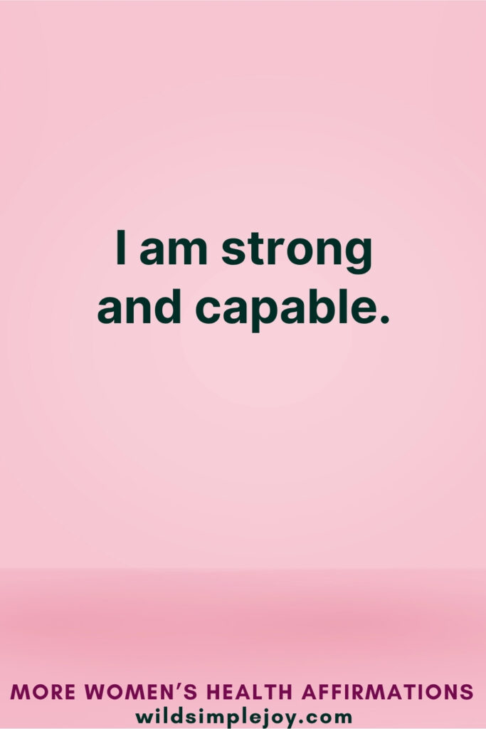 Vertical Pinterest Image on pink background with text overlay that reads I am strong and capable More Women's Health Affirmations at wildsimplejoy.com