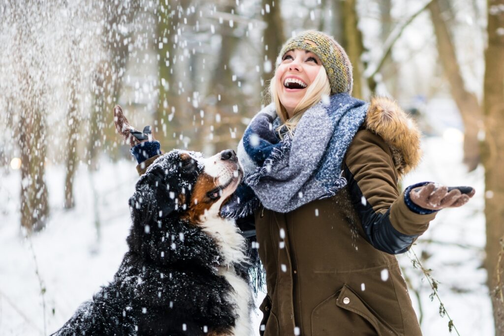 Aquarius woman playing out in the snow