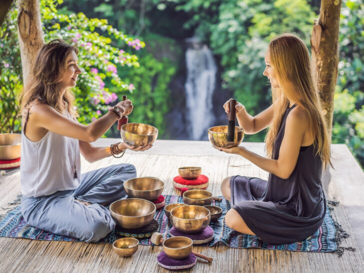 Spiritual women with Tibetan singing bowls for New Year's