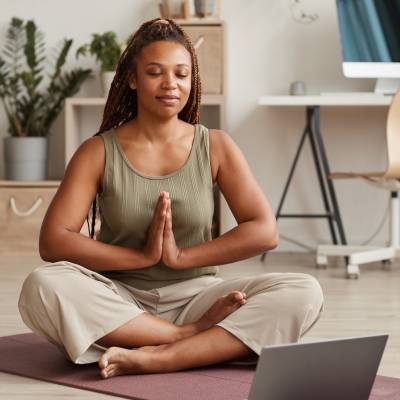 Woman meditating indoors