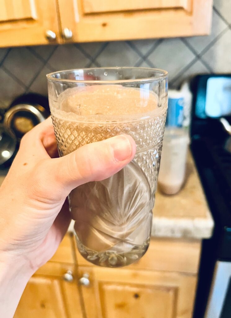 8 oz of Organic Plant-based protein shake in a glass