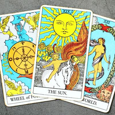 Rider Waite tarot cards, The Sun, the World, and Wheel of Fortune