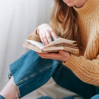 Woman reading a second hand book