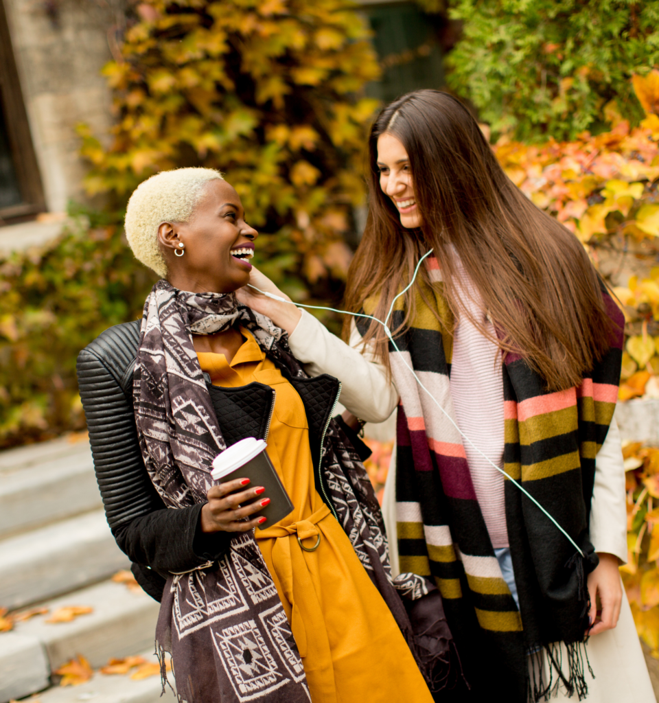 Women socializing outdoors in autumn