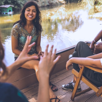 A woman telling a story to another