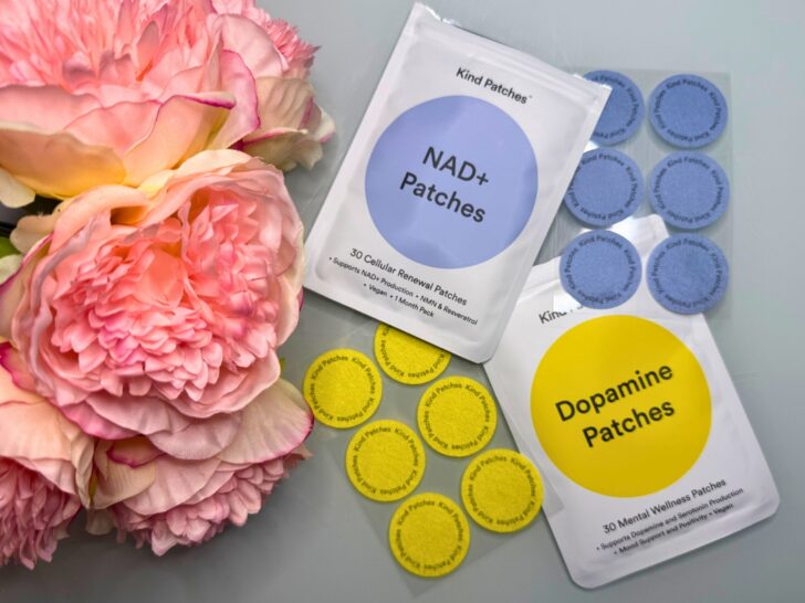 Featured Image for Kind Patches Review, picture of Kind Dopamine Patches and NAD+ Patches on a table with flowers
