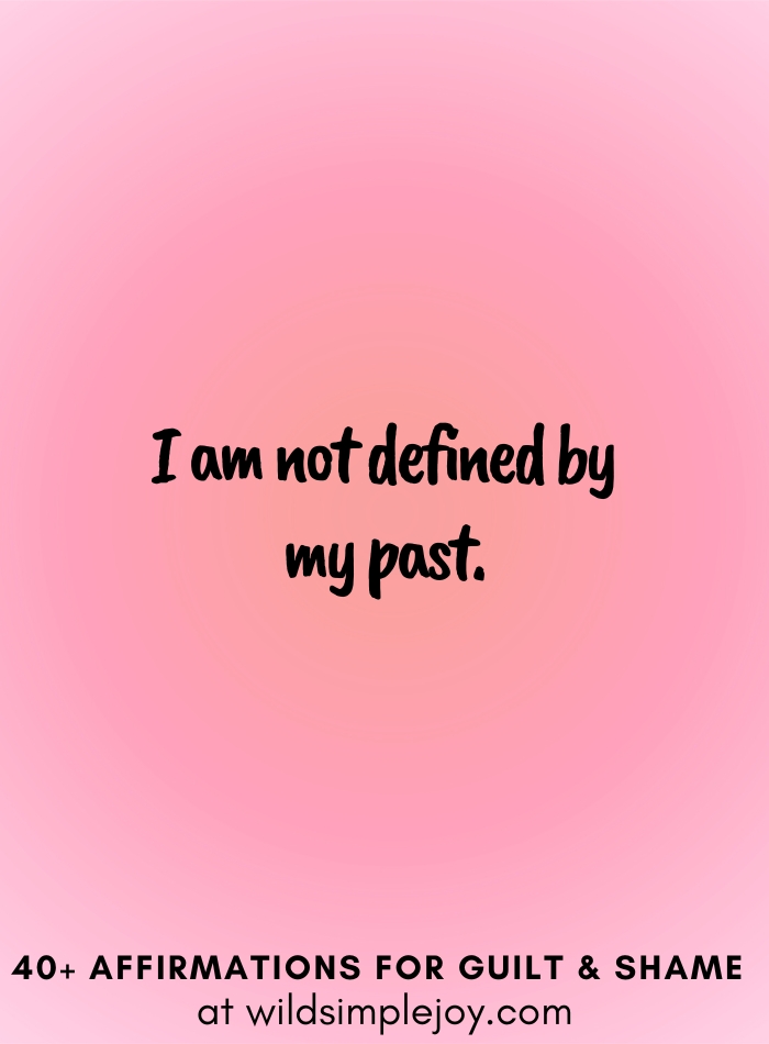 Vertical social media image with pink gradient background with text overlay that reads I am not defined by my past 40+ Affirmations for Guilt & Shame at wildsimplejoy.com