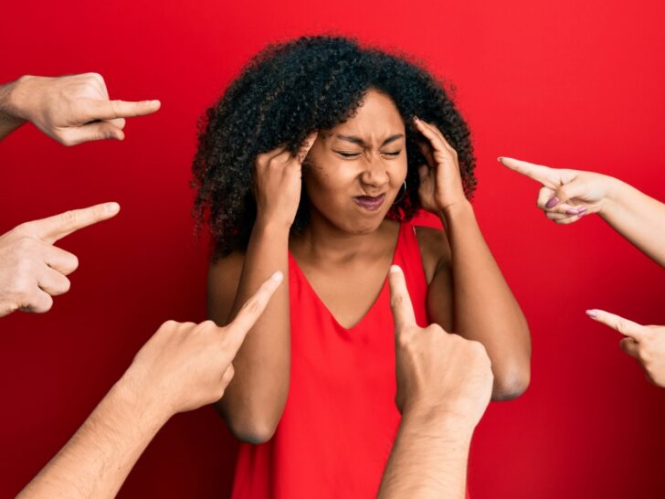 Woman getting pointed at and blamed