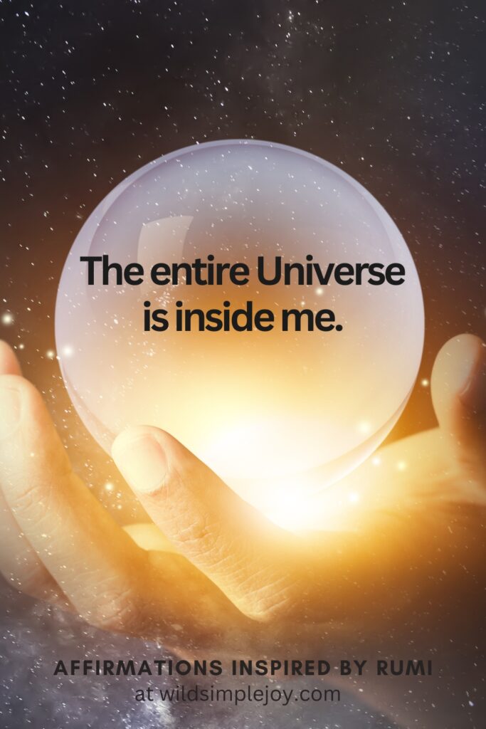 Vertical Social Media image with hand holding glass ball and text overlay The entire universe is inside me. Affirmations Inspired by Rumi at wildsimplejoy.com